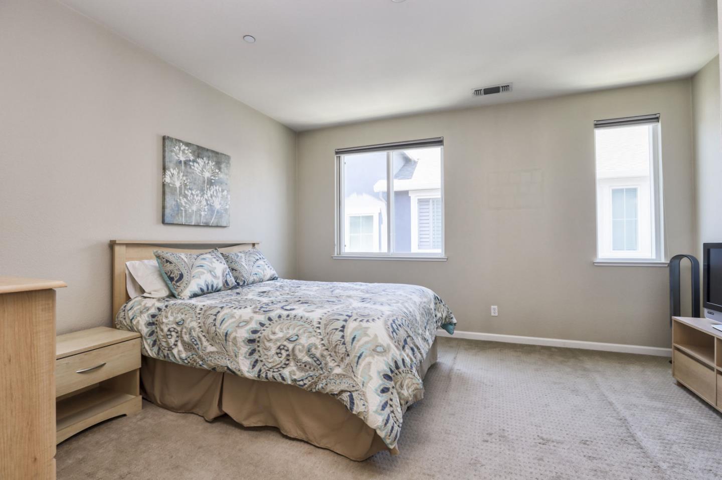 907 Rancho Place San Jose, CA 95126 - Photo 34 of 50 a bedroom with a bed and a window