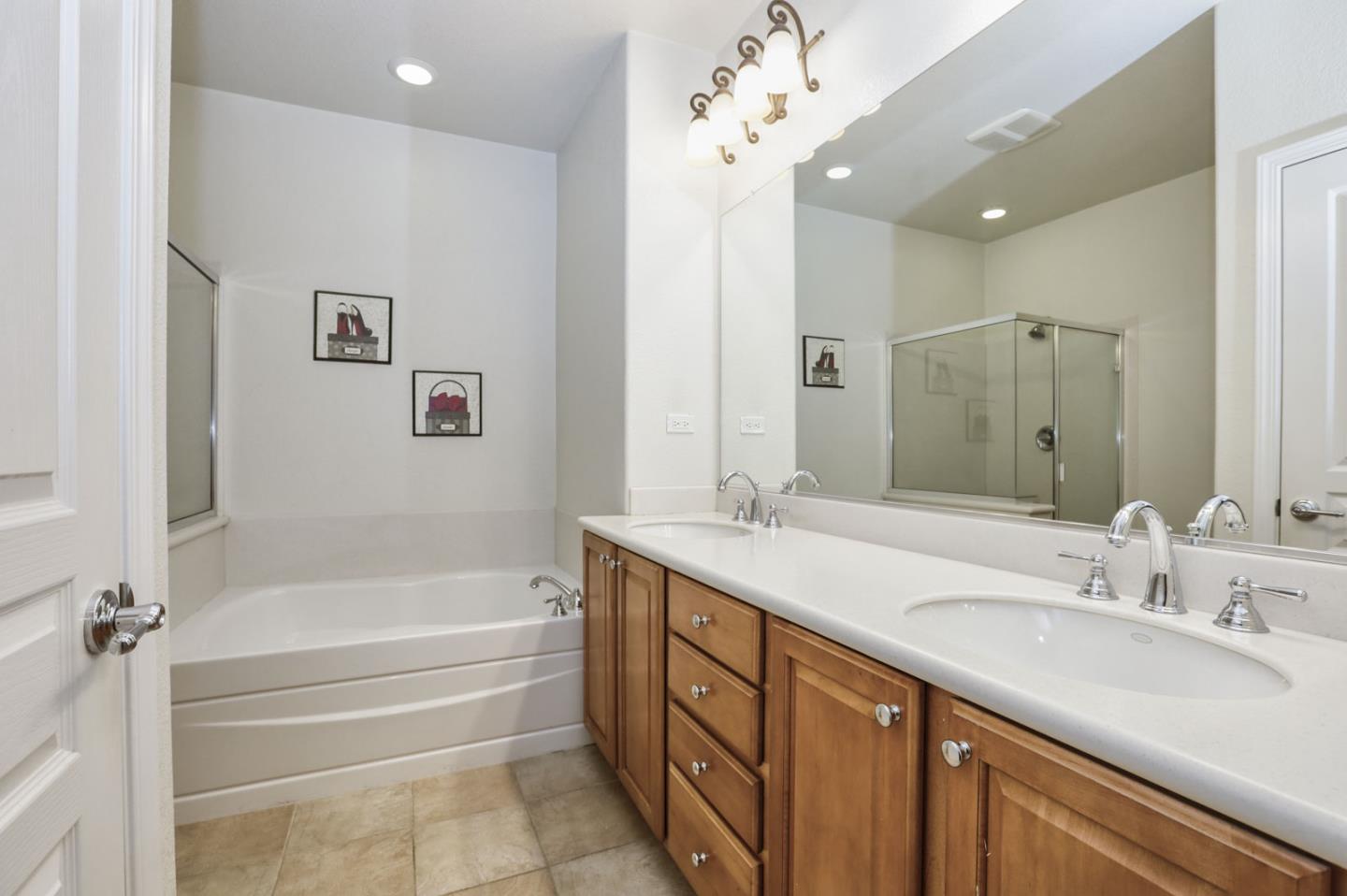 907 Rancho Place San Jose, CA 95126 - Photo 37 of 50 a bathroom with a tub sink double vanity and granite