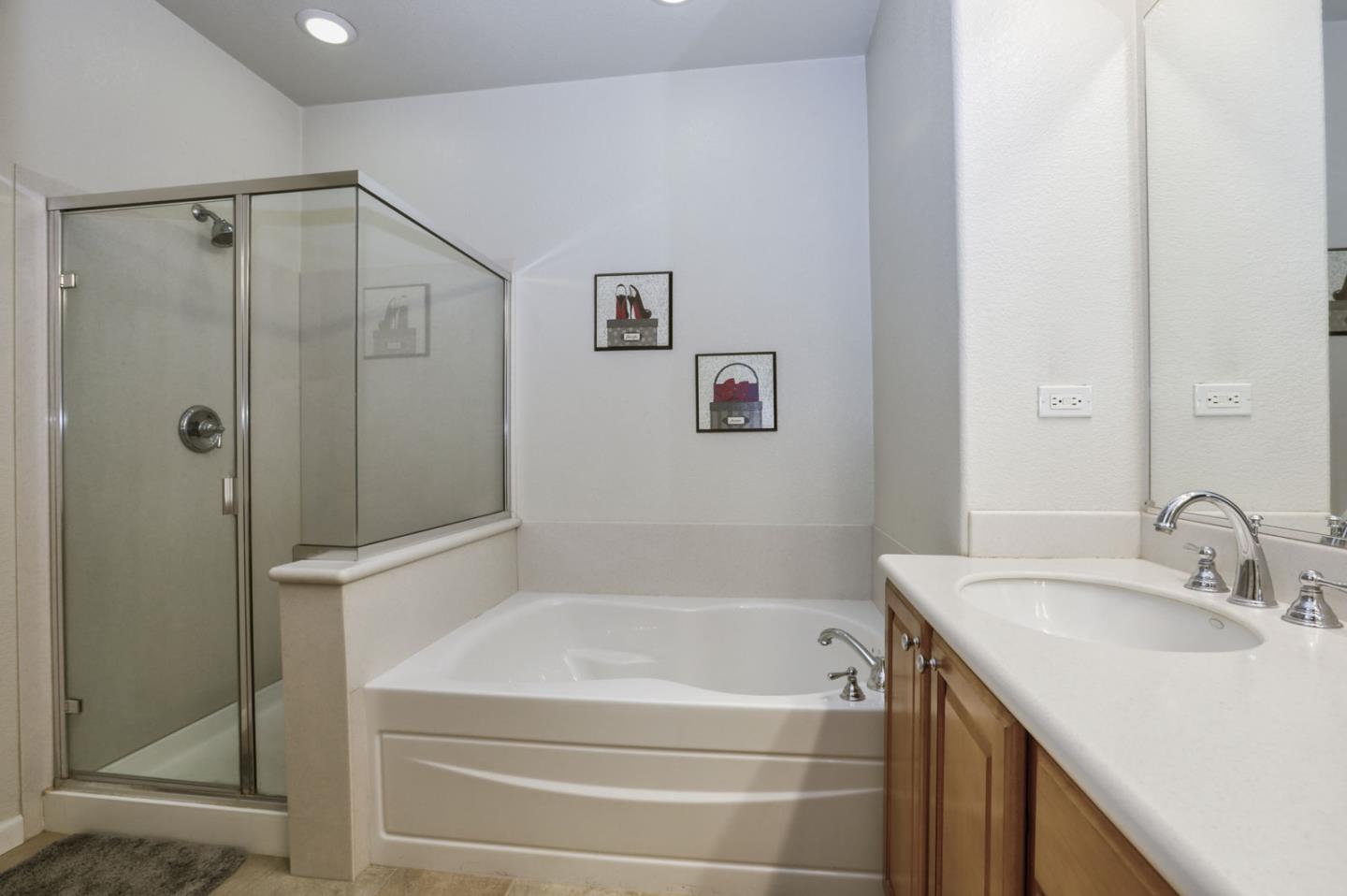 907 Rancho Place San Jose, CA 95126 - Photo 38 of 50 a bathroom with a granite countertop bathtub shower sink vanity and toilet