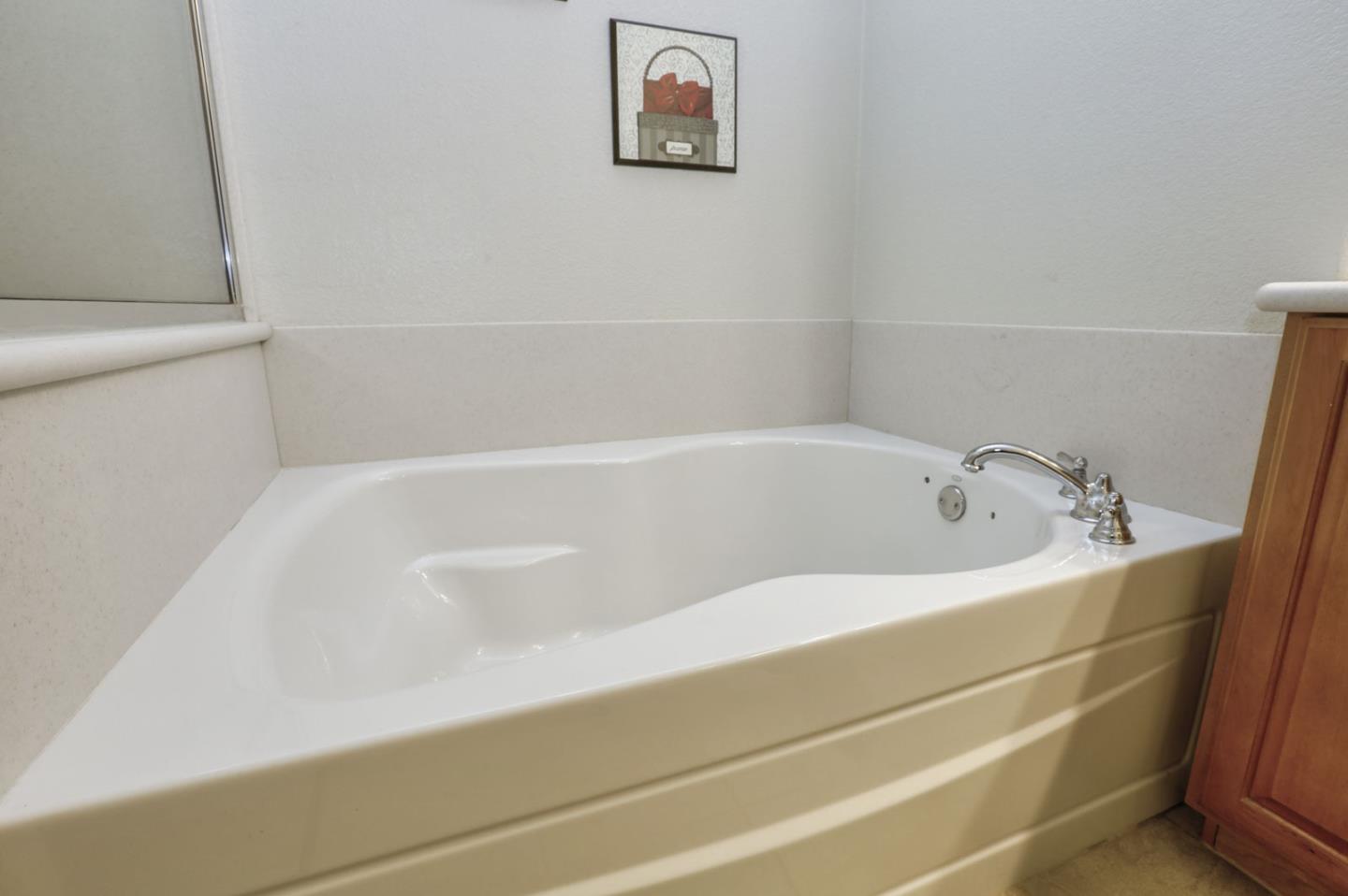 907 Rancho Place San Jose, CA 95126 - Photo 40 of 50 a bathroom with a bathtub