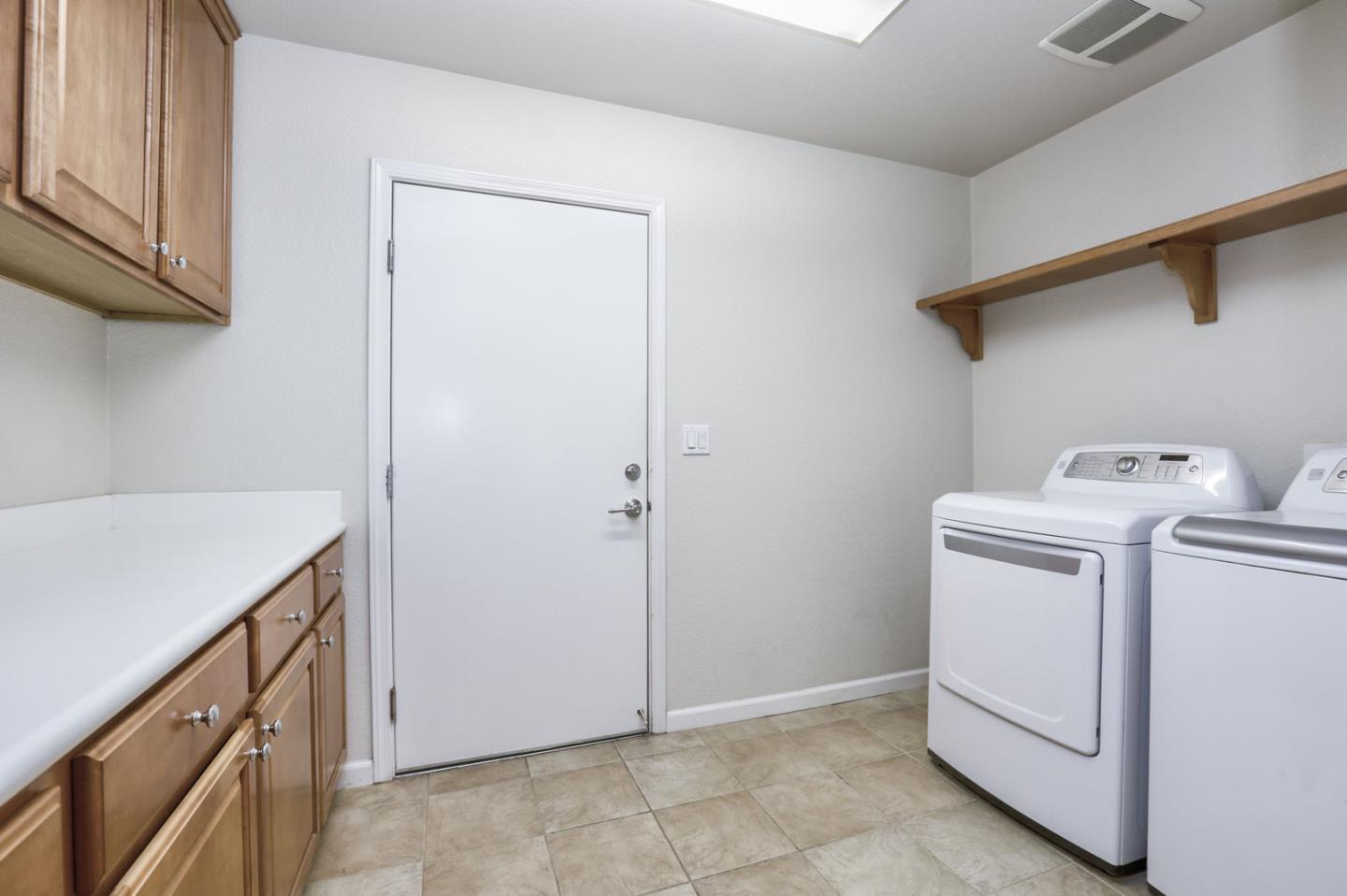907 Rancho Place San Jose, CA 95126 - Photo 42 of 50 a view of storage and utility room with washer and dryer