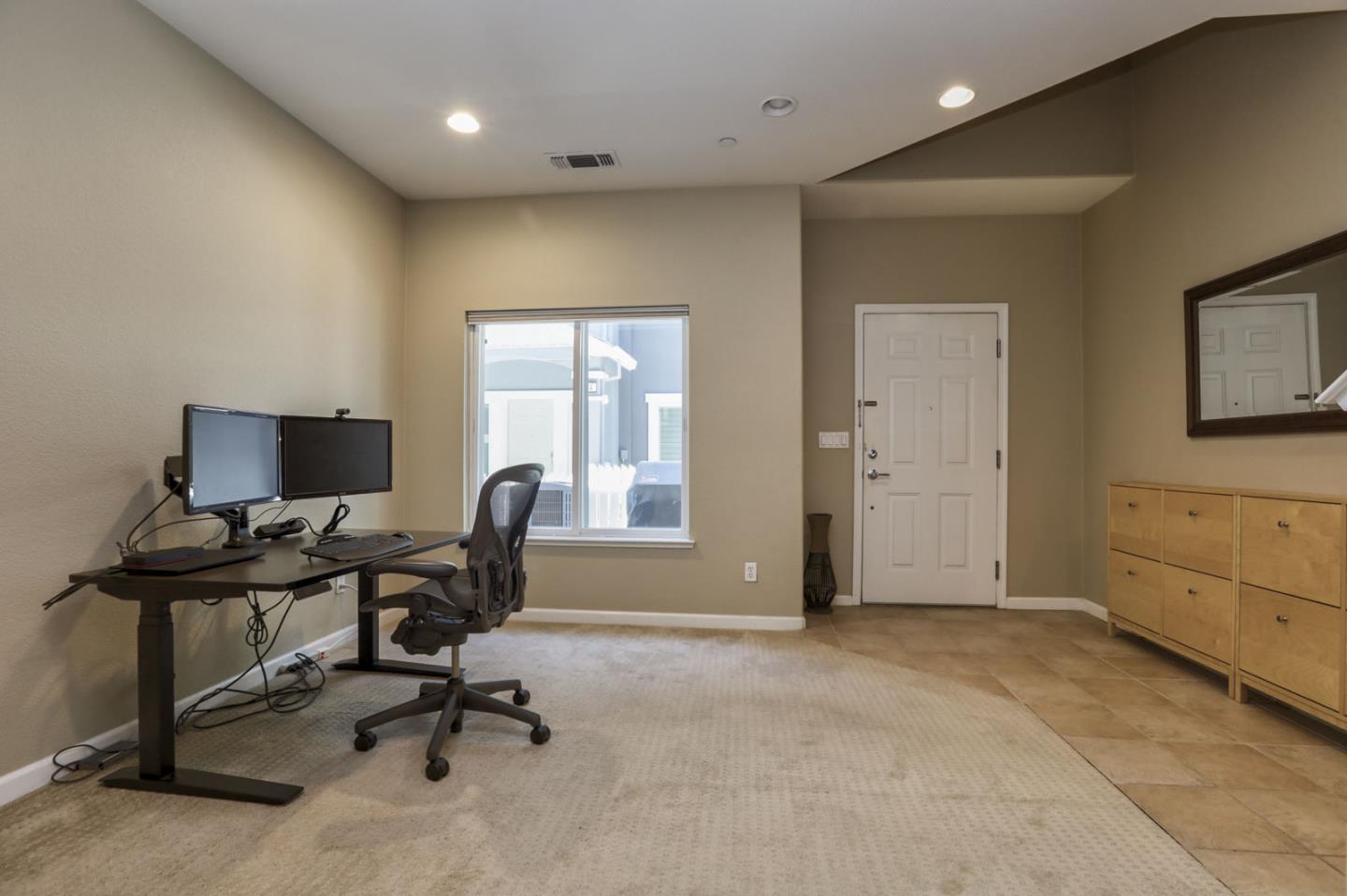 907 Rancho Place San Jose, CA 95126 - Photo 8 of 50 a view of a workspace with furniture and a window