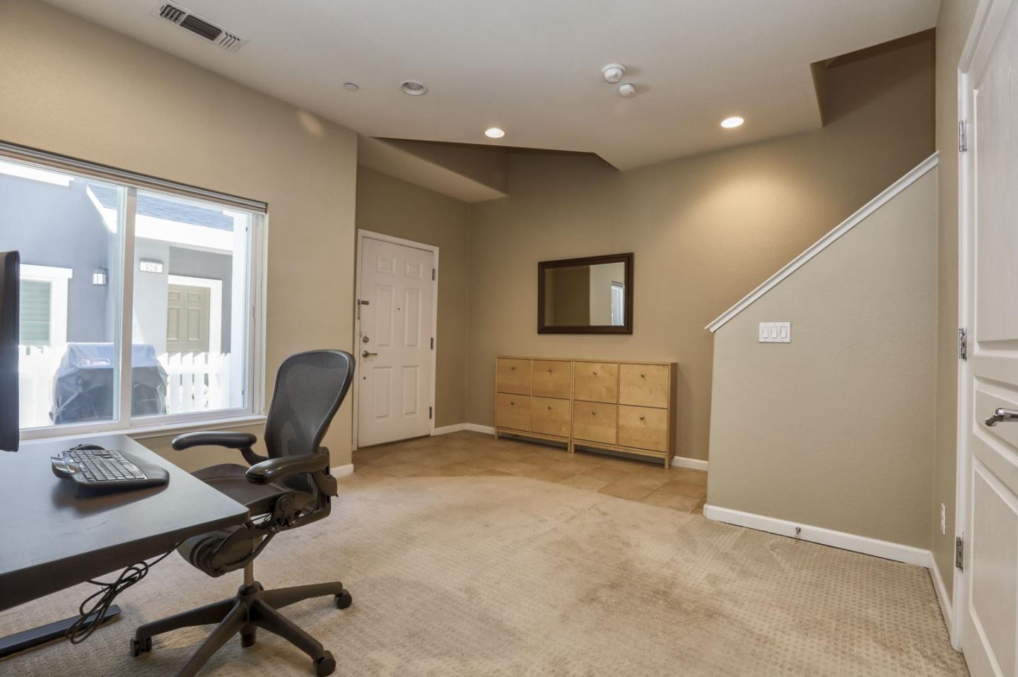 907 Rancho Place San Jose, CA 95126 - Photo 9 of 50 a view of a workspace with furniture and a window