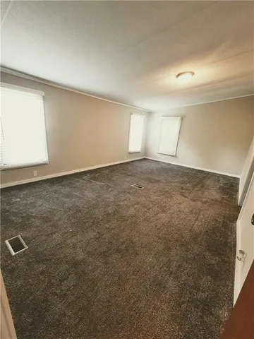 an empty room with a natural light