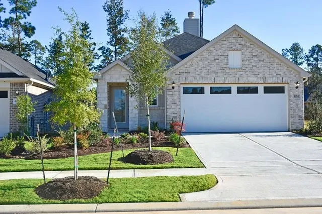 a front view of house with a yard