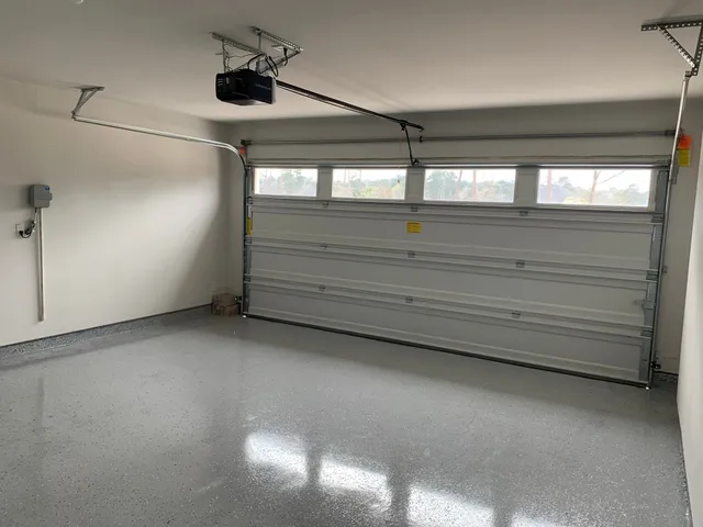 a view of house with garage