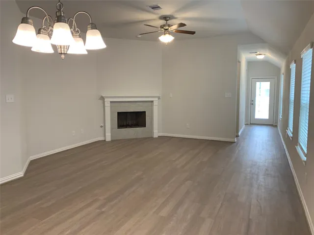 a kitchen with stainless steel appliances granite countertop a refrigerator stove microwave and sink