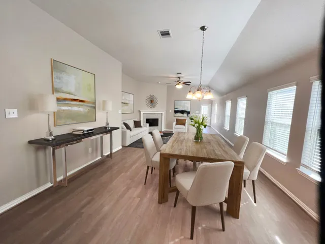a view of bedroom with wooden floor