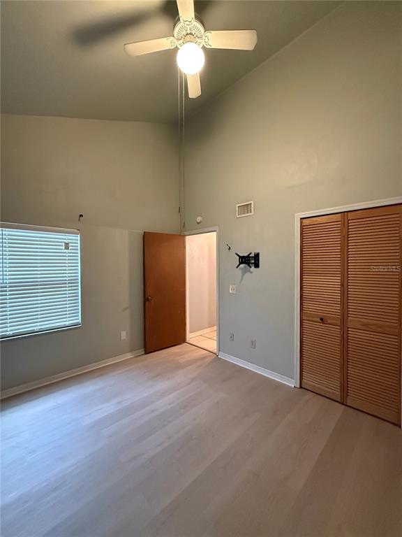 7200 Southwest 8th Avenue, Unit T128 Gainesville, FL 32607 - Photo 14 of 38 an empty room with windows and closet