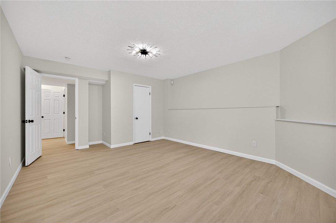 811 Wind Bluff Point Springboro, OH 45066 - Photo 40 of 51 This expansive room offers an open layout, ideal for versatile living arrangements.