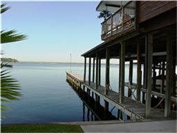 844 Beach Walk Boulevard Conroe, TX 77304 - Photo 2 of 20 a view of a balcony with chairs