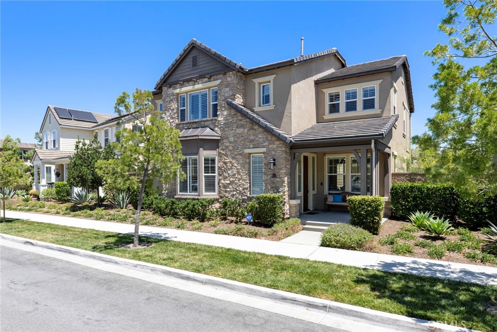 29 Windrow Road Tustin, CA 92782 - Photo 1 of 1 a front view of a house with a yard