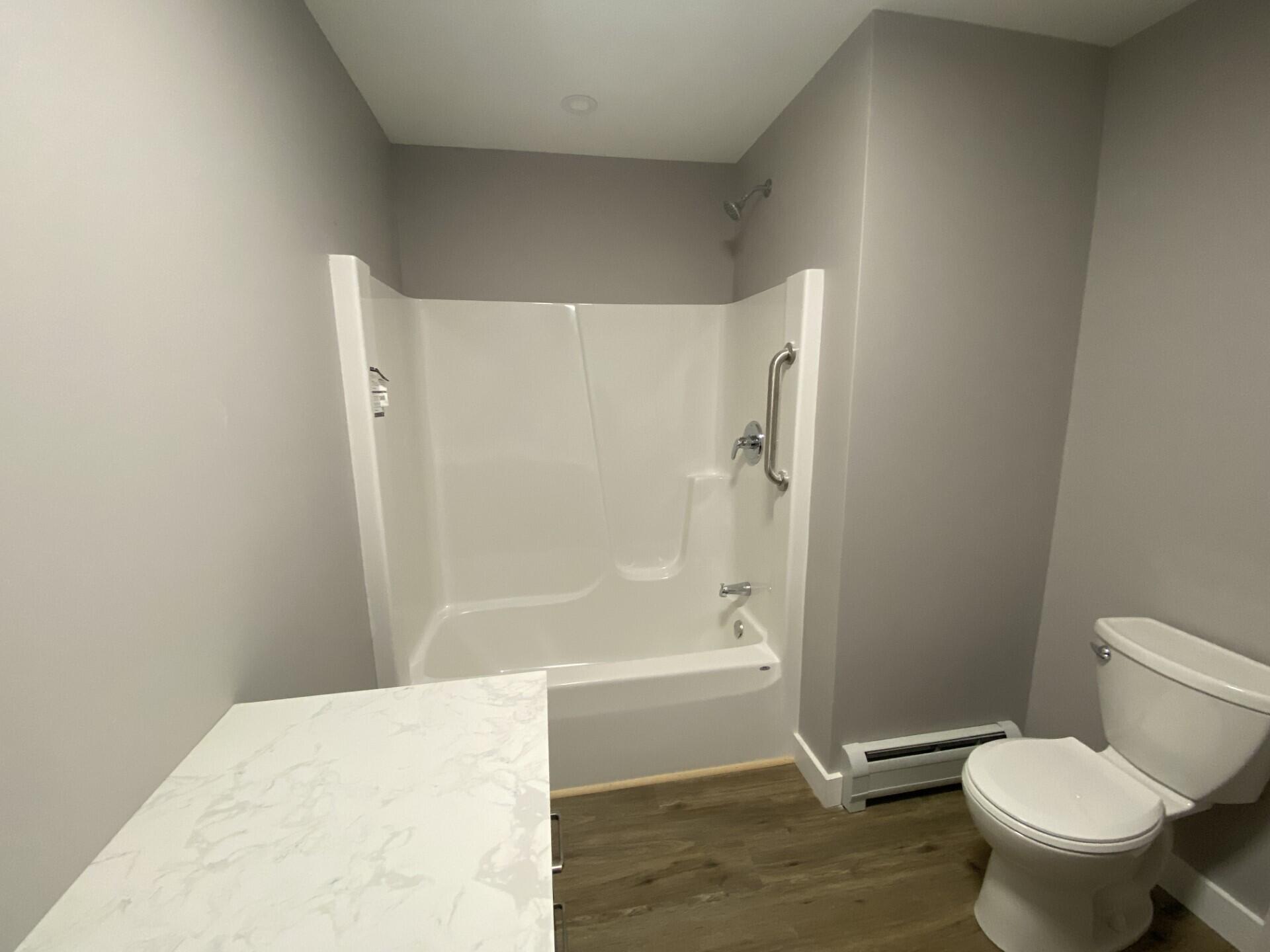 11 Chestnut Street Unity, ME 04988 - Photo 25 of 33 Primary bathroom shower and tub