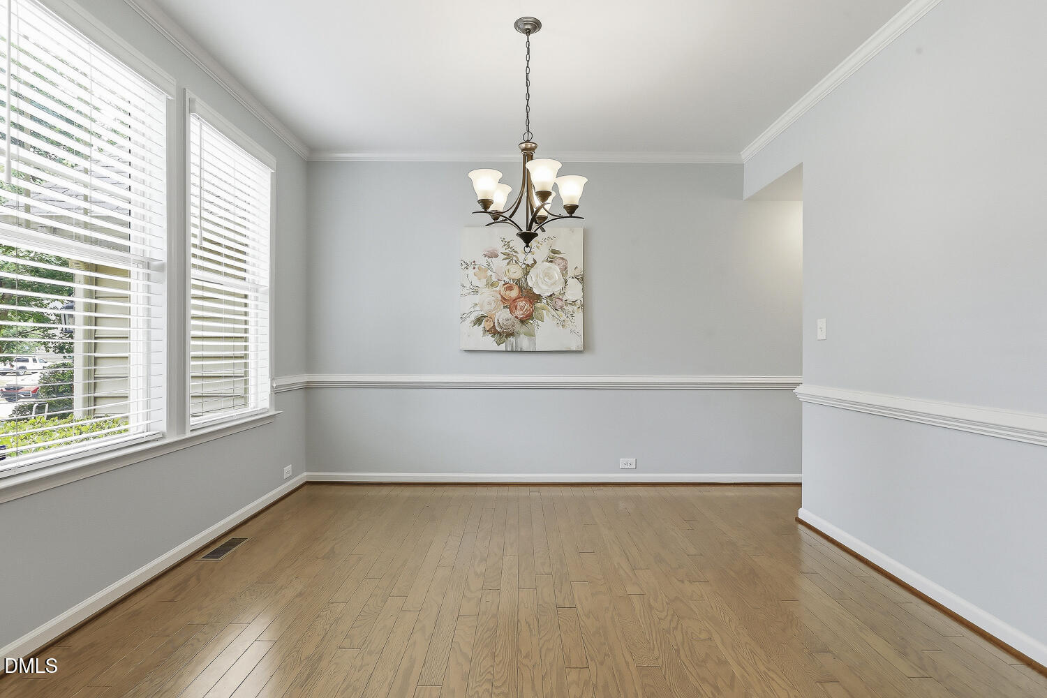 441 Virginia Water Drive Rolesville, NC 27571 - Photo 6 of 20 a view of a room with wooden floor and a window