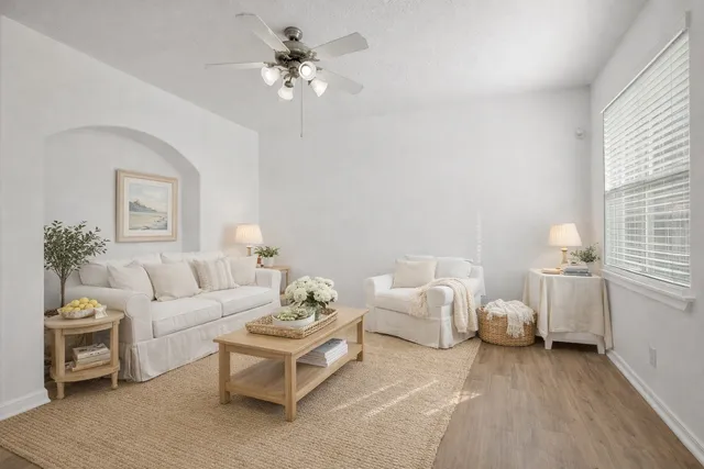 a bathroom with a bathtub and a window