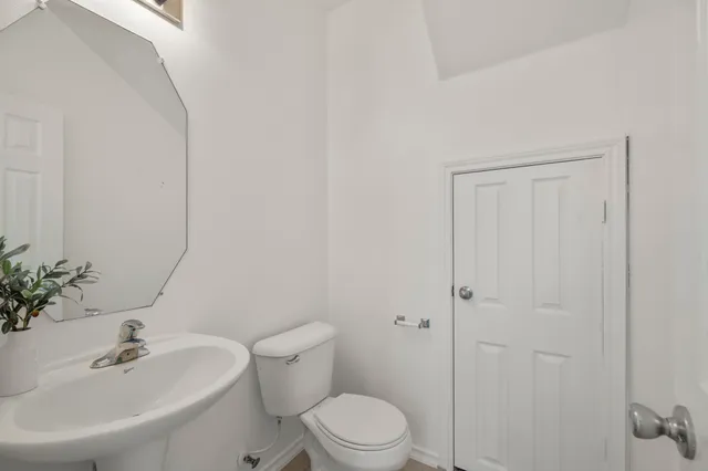 a view of storage and utility room with washer and dryer