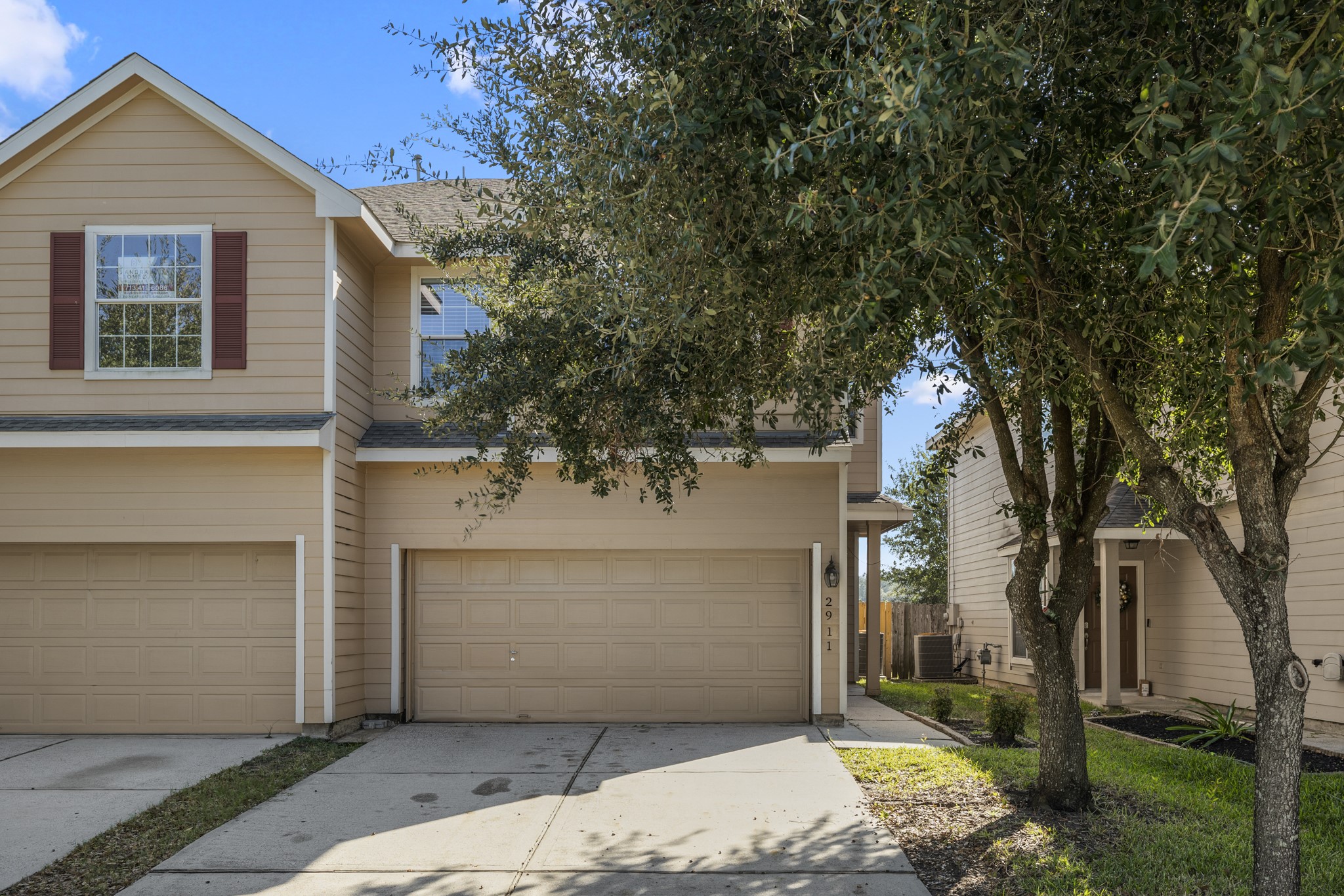 2911 Hackamore Hollow Lane Houston, TX 77014 - Photo 4 of 49 a front view of a house with a tree