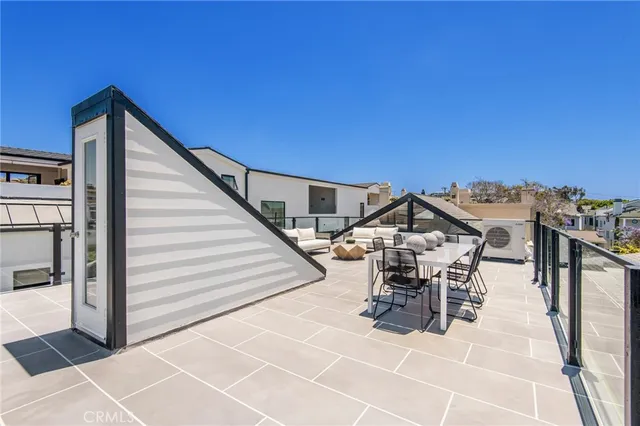 a view of a terrace with seating area