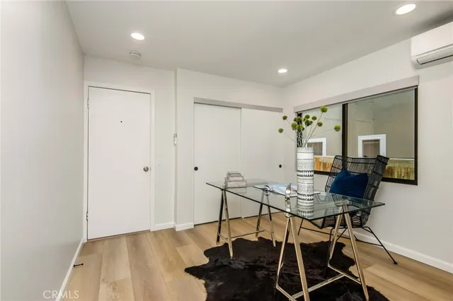 a workspace with furniture and bathroom