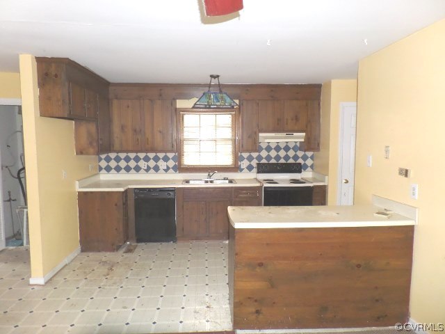 10649 Genlou Road Chesterfield, VA 23832 - Photo 6 of 18 a kitchen with stainless steel appliances kitchen island granite countertop a stove a sink and a refrigerator
