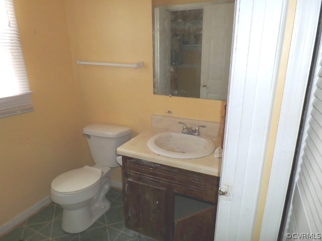 10649 Genlou Road Chesterfield, VA 23832 - Photo 7 of 18 a bathroom with a sink and a toilet