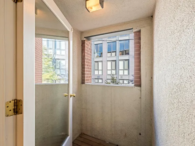 a lobby with furniture and lots of tables