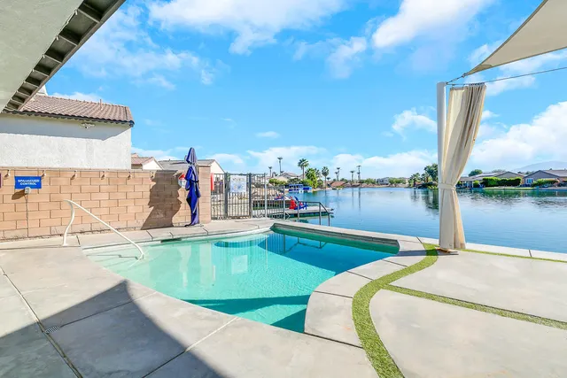 a view of a living room and kitchen
