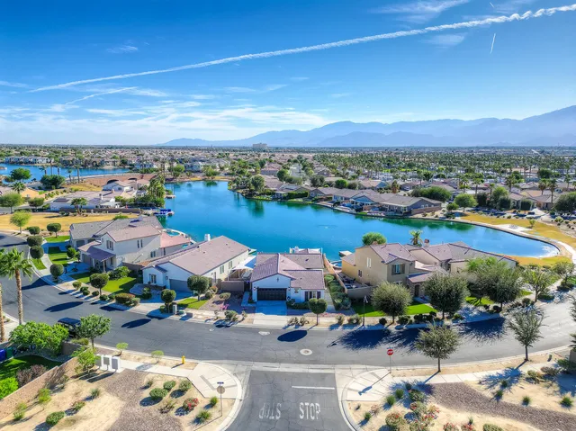 an aerial view of a houses with outdoor space