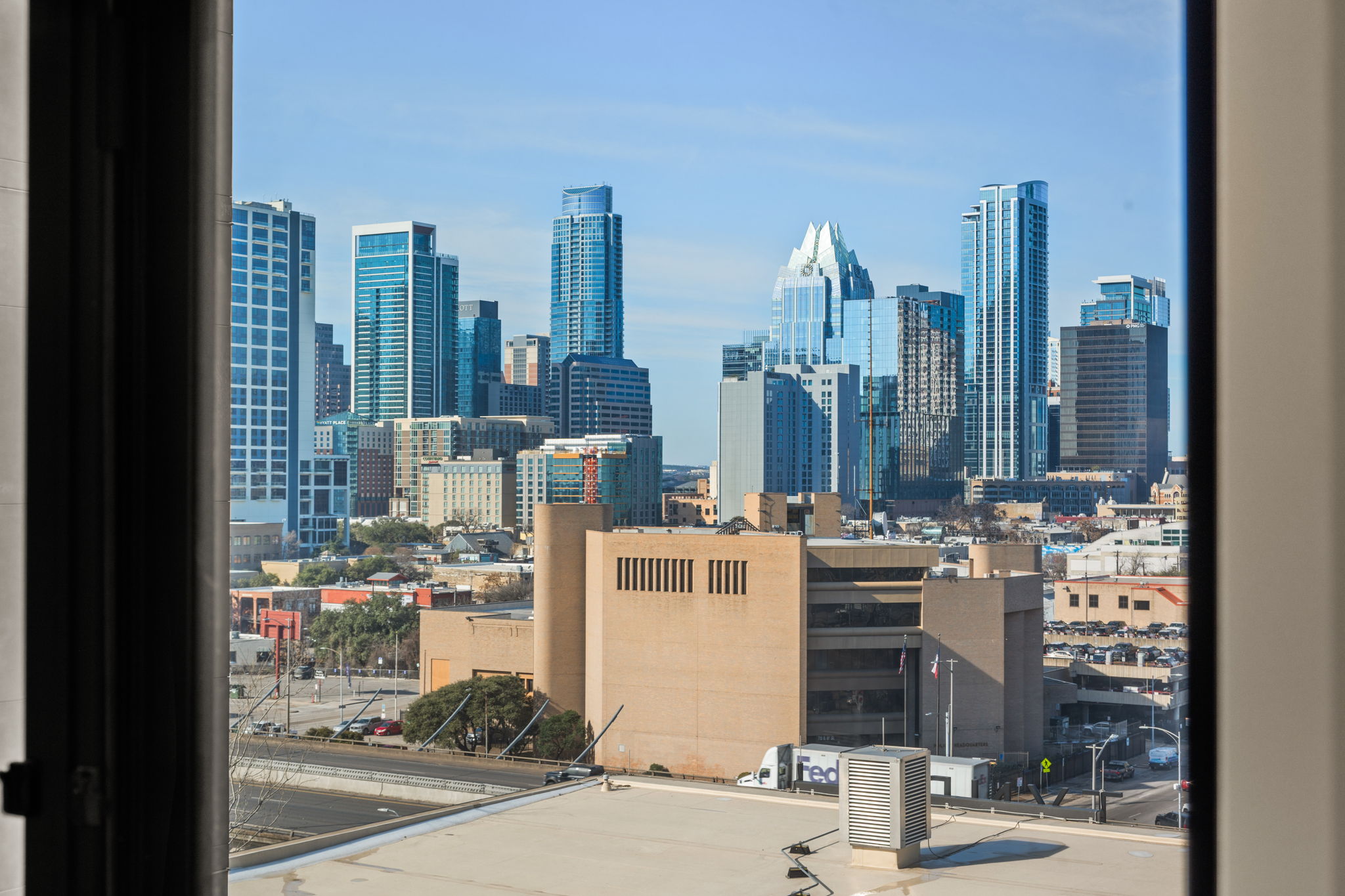 800 Embassy Drive, Unit 322 Austin, TX 78702 - Photo 15 of 31 a view of a city with tall buildings