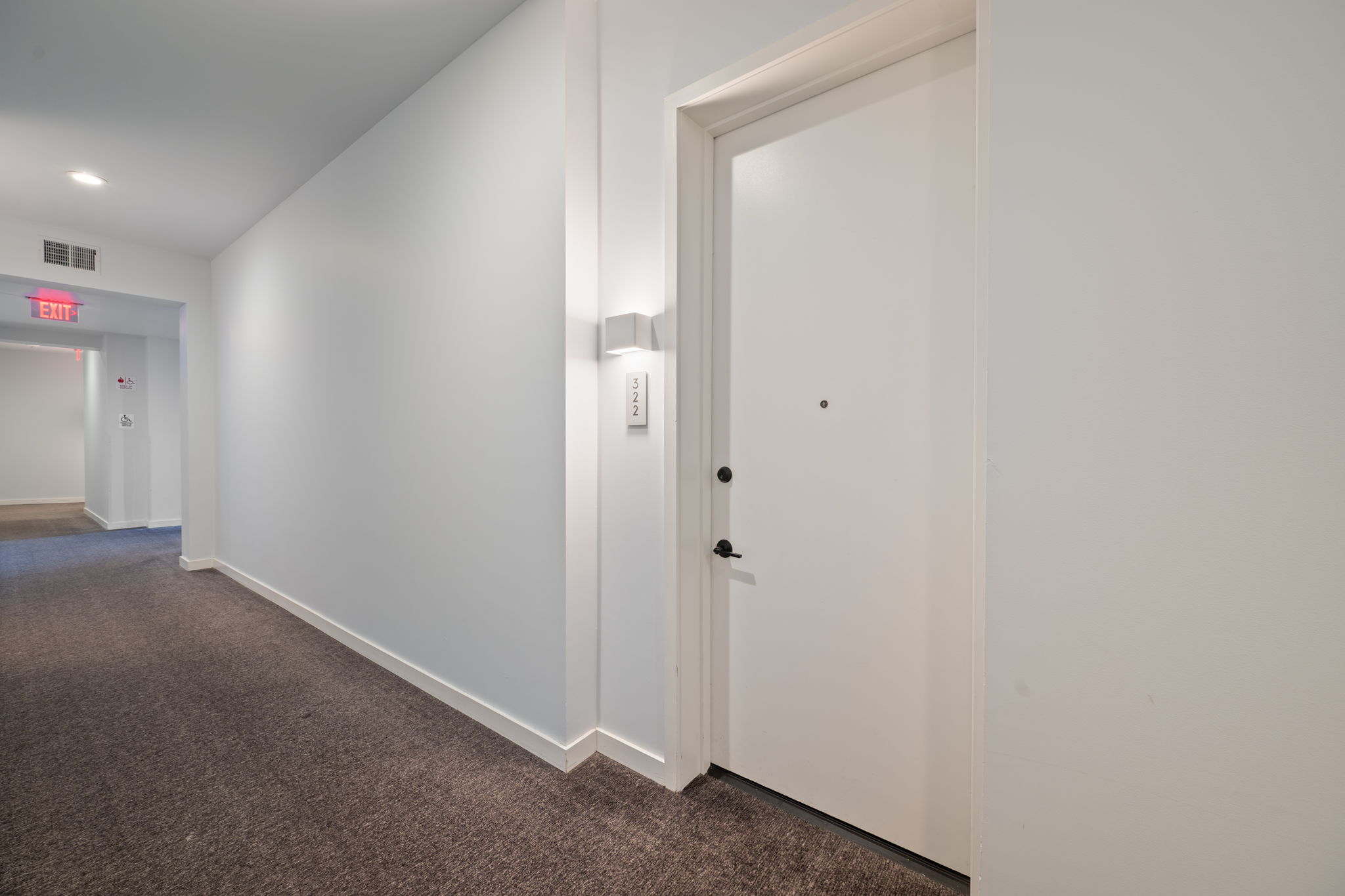 800 Embassy Drive, Unit 322 Austin, TX 78702 - Photo 20 of 31 a view of hallway with closet