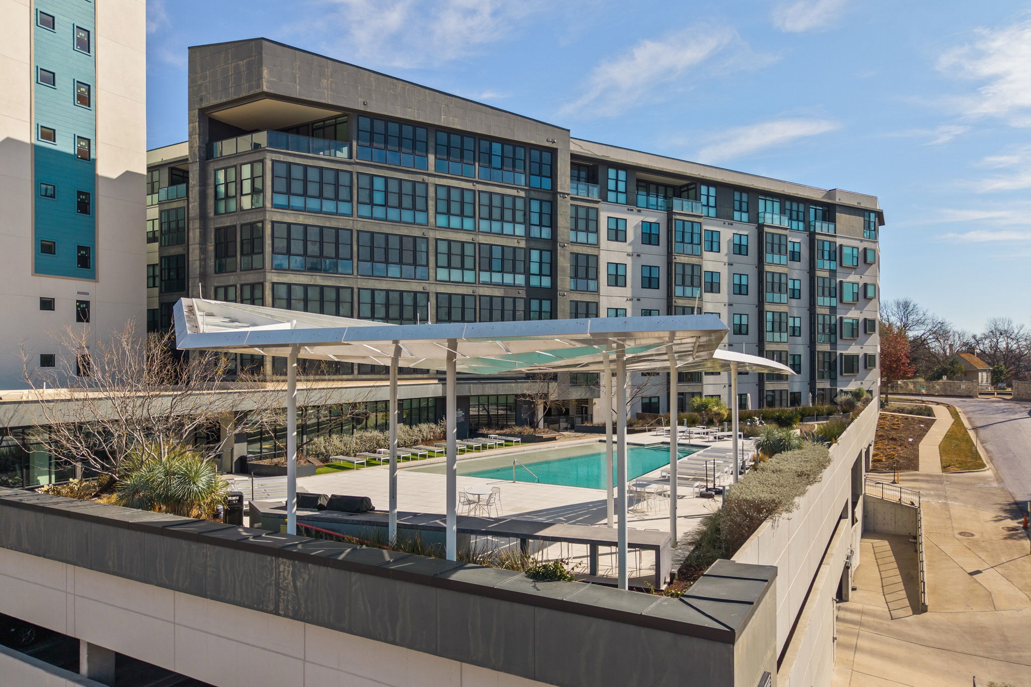800 Embassy Drive, Unit 322 Austin, TX 78702 - Photo 21 of 31 a front view of a building with glass windows