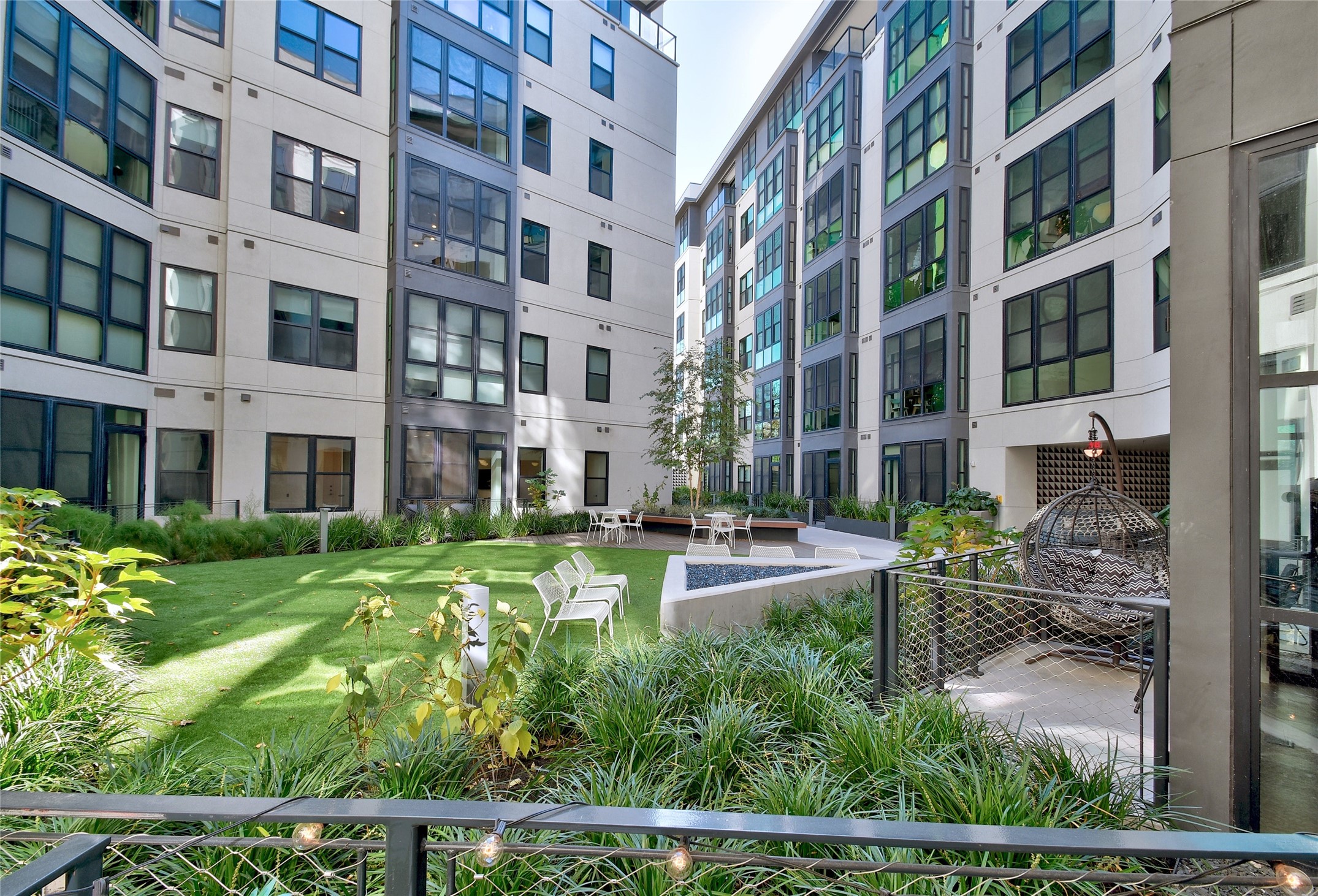 800 Embassy Drive, Unit 322 Austin, TX 78702 - Photo 25 of 31 a view of a building with garden