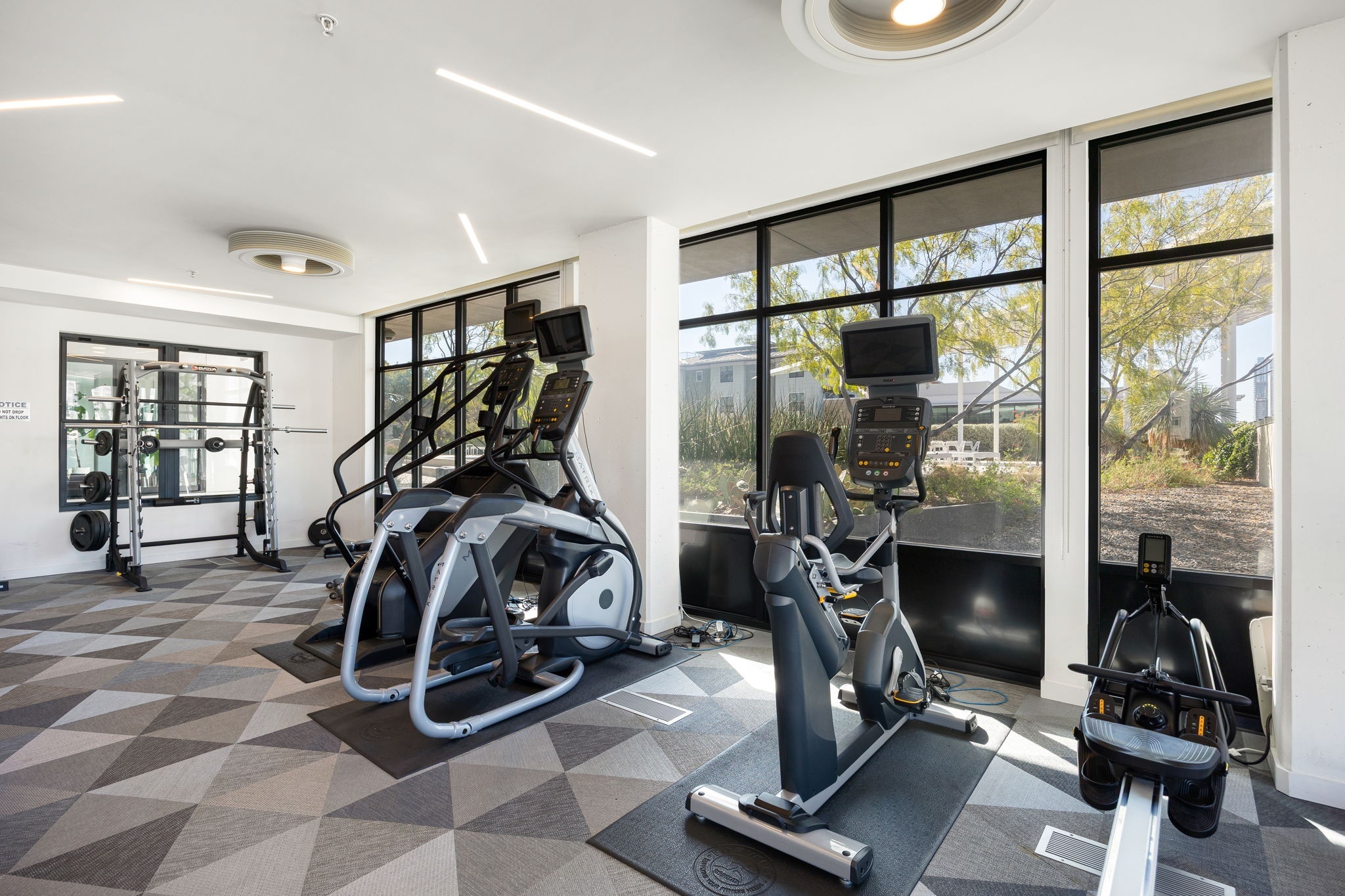 800 Embassy Drive, Unit 322 Austin, TX 78702 - Photo 27 of 31 a view of a room with gym equipment
