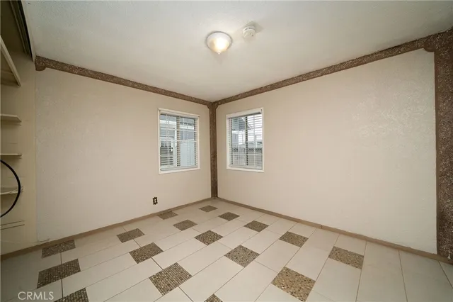 an empty room with windows