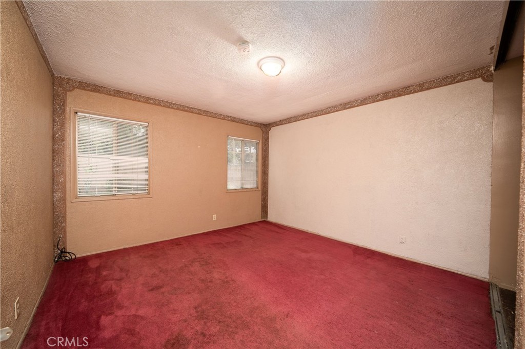 728 Geneva Street Anaheim, CA 92801 - Photo 14 of 24 an empty room with windows