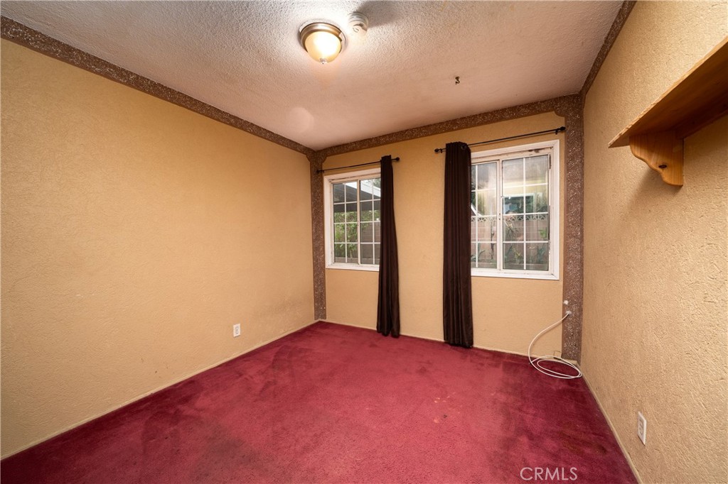 728 Geneva Street Anaheim, CA 92801 - Photo 15 of 24 an empty room with windows