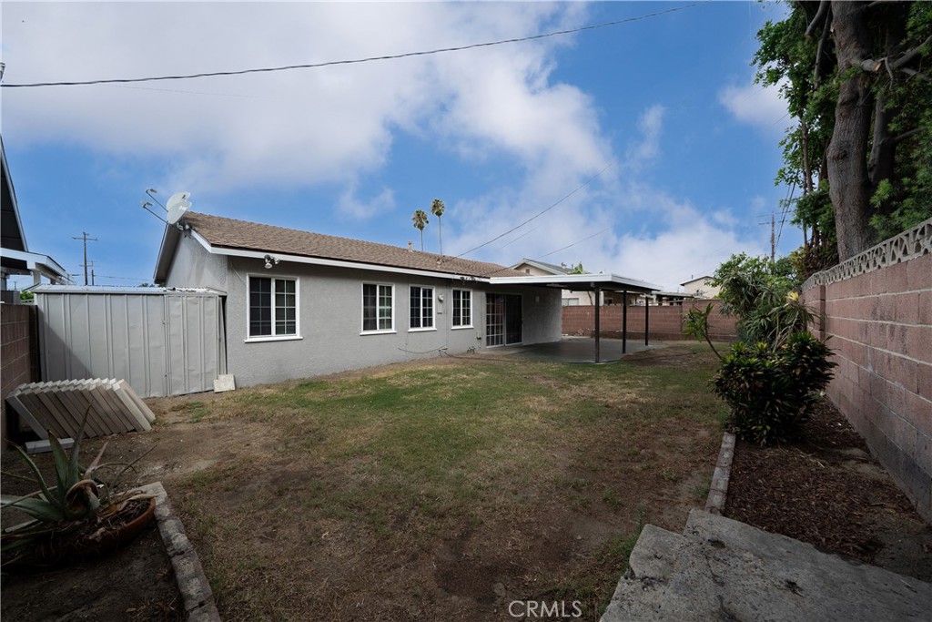 728 Geneva Street Anaheim, CA 92801 - Photo 18 of 24 a backyard of a house with lots of green space