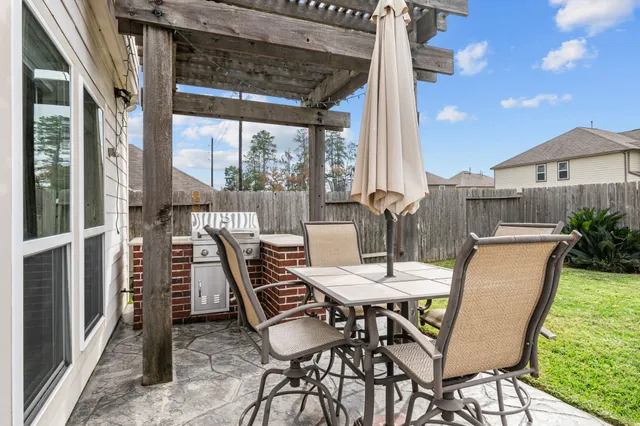 a view of a outdoor seating area with furniture