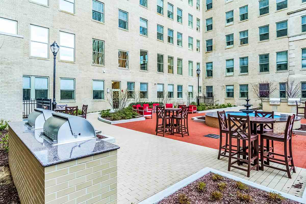 88 Clifton Place, Unit 201 Jersey City, NJ 07304 - Photo 9 of 10 a view of a swimming pool with outdoor seating