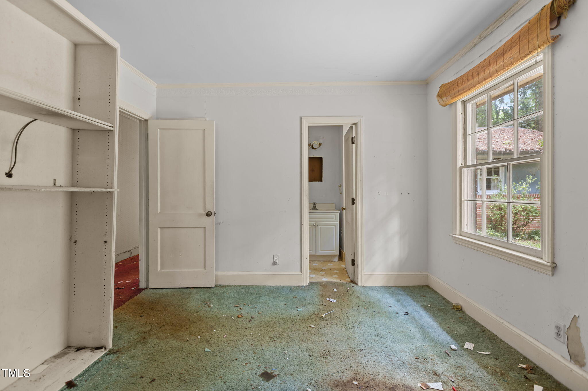 1409 Trailwood Drive Raleigh, NC 27606 - Photo 8 of 32 an empty room with windows