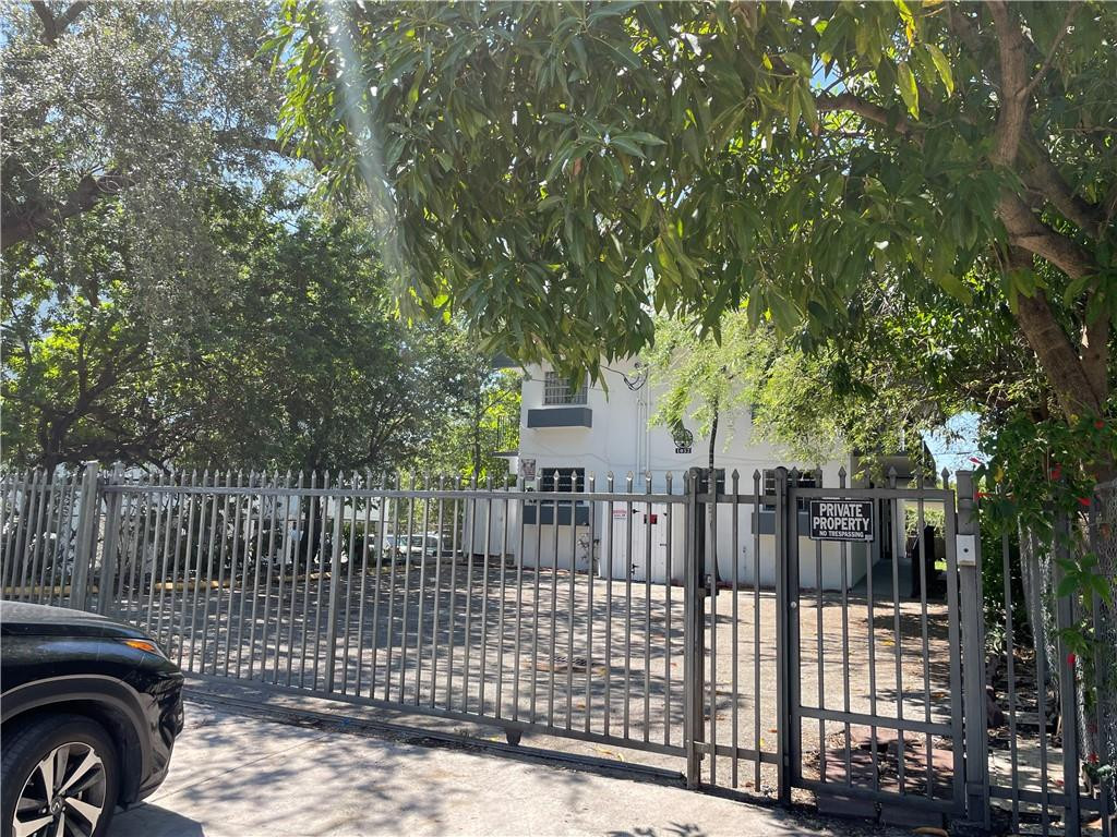 Undisclosed Address Miami, FL 33128 - Photo 1 of 23 a view of street along with trees