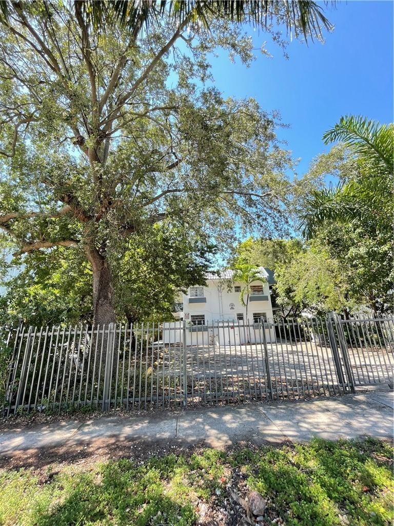 Undisclosed Address Miami, FL 33128 - Photo 3 of 23 a view of a wrought fence