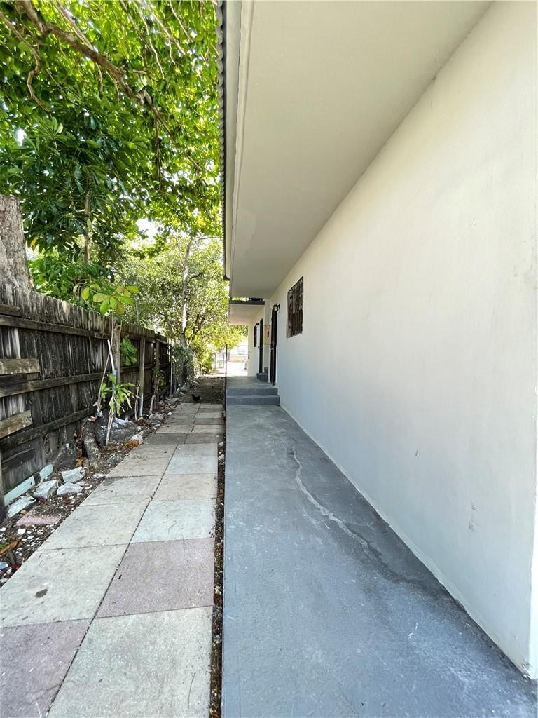 Undisclosed Address Miami, FL 33128 - Photo 6 of 23 a view of backyard with green space