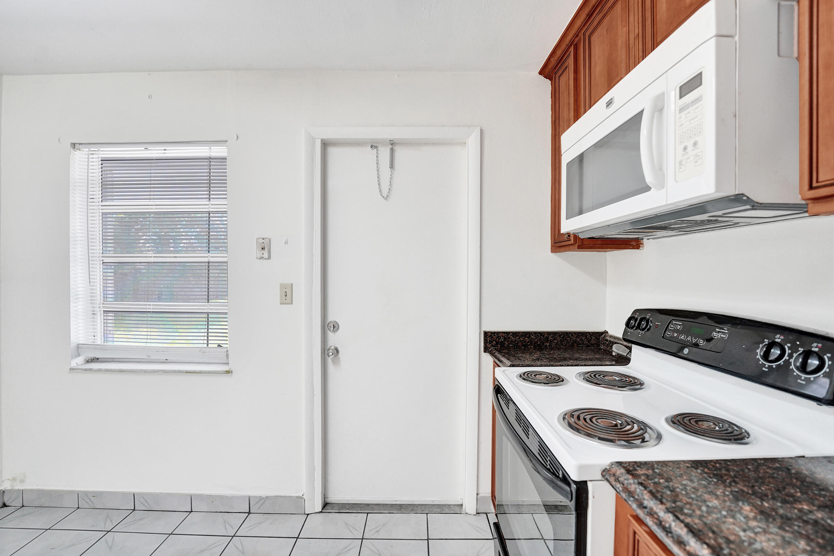5830 Garfield Street Hollywood, FL 33021 - Photo 36 of 54 Unit 2 Exit Door to Yard