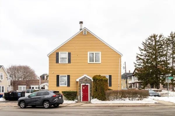 a view of street along with parked cars