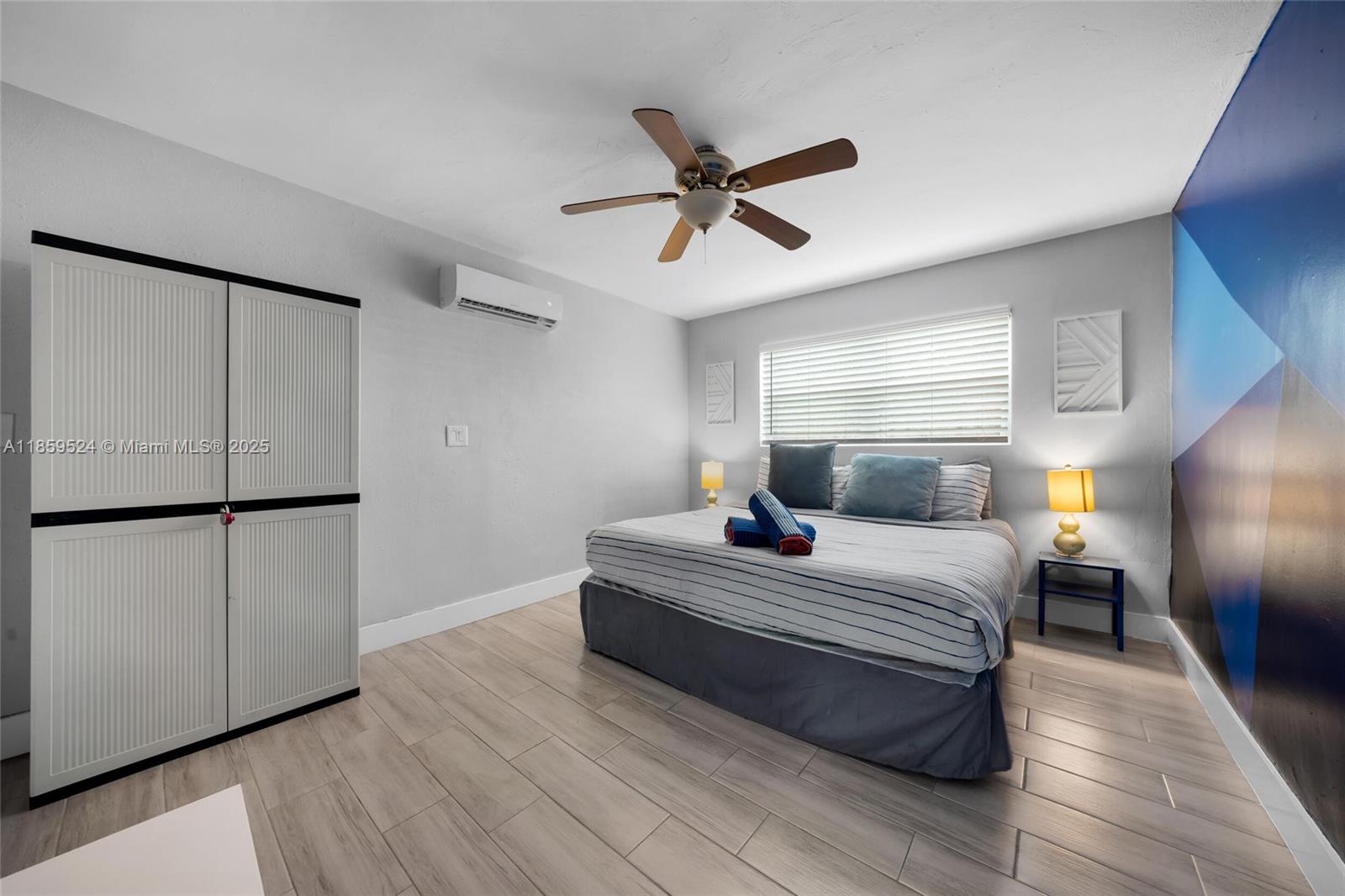 817 Southwest 12th Avenue Fort Lauderdale, FL 33315 - Photo 13 of 37 a bedroom with a bed and a ceiling fan