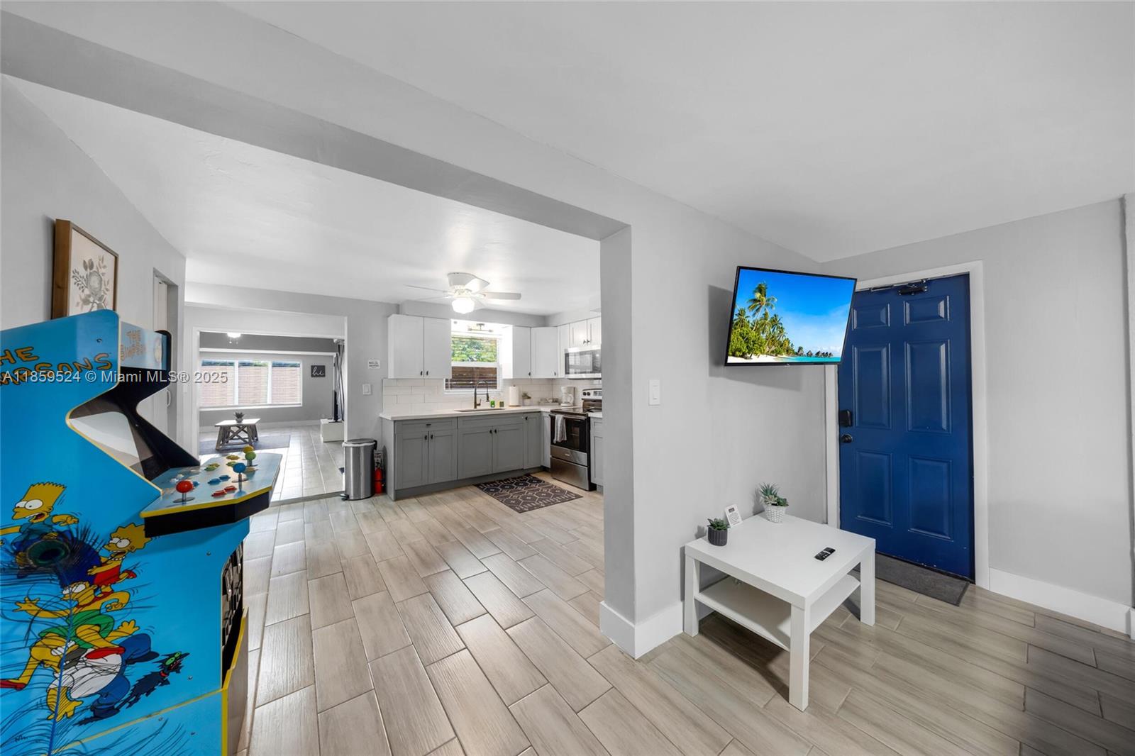 817 Southwest 12th Avenue Fort Lauderdale, FL 33315 - Photo 19 of 37 a living room with furniture and a wooden floor