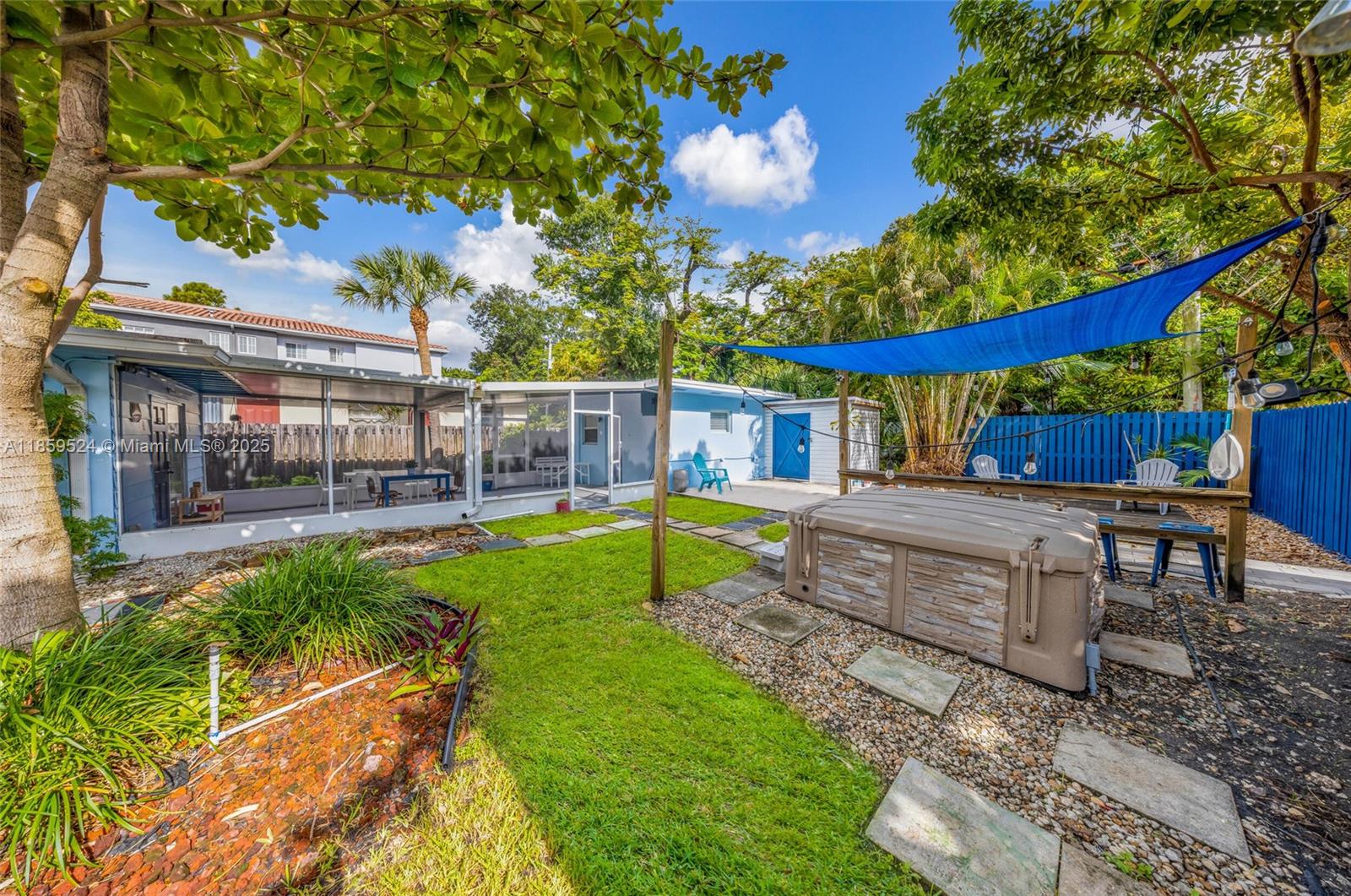 817 Southwest 12th Avenue Fort Lauderdale, FL 33315 - Photo 26 of 37 a view of a house with a yard patio and sitting area