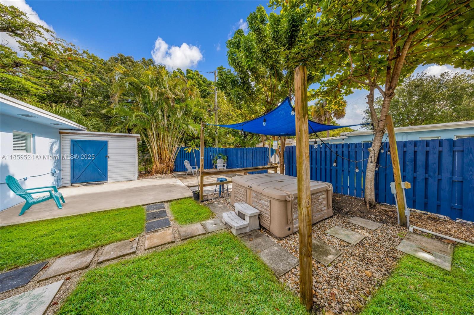 817 Southwest 12th Avenue Fort Lauderdale, FL 33315 - Photo 28 of 37 a view of a house with backyard and sitting area