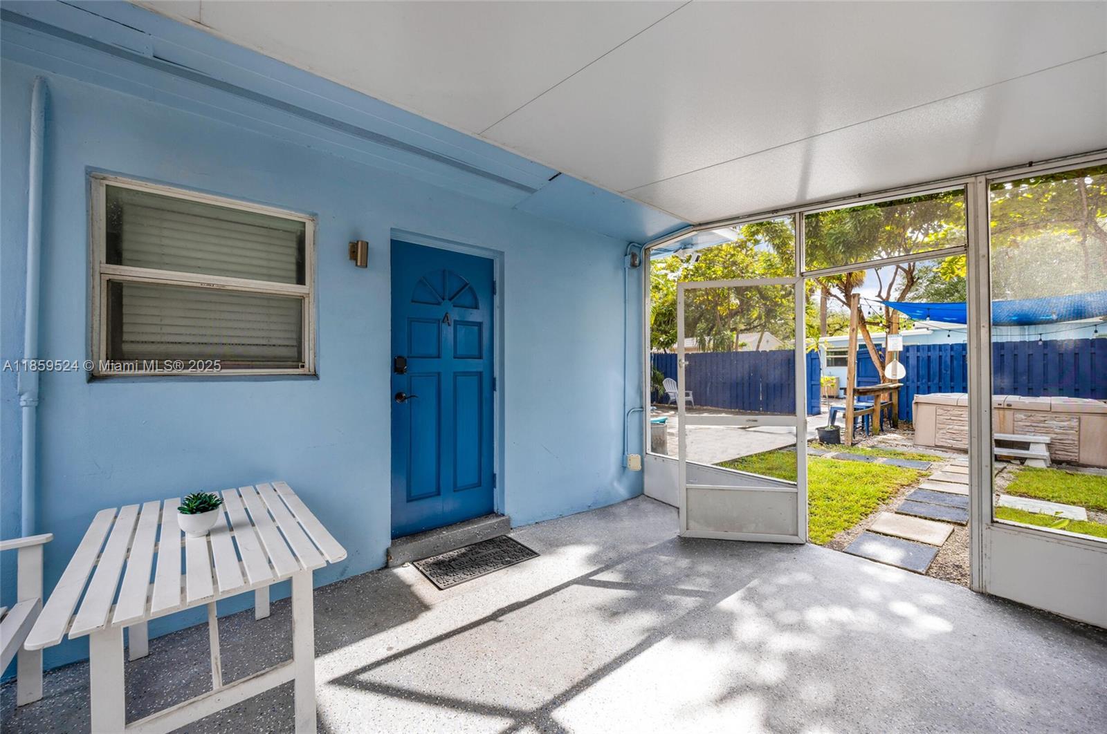817 Southwest 12th Avenue Fort Lauderdale, FL 33315 - Photo 29 of 37 a bed room with a bed and a view of balcony